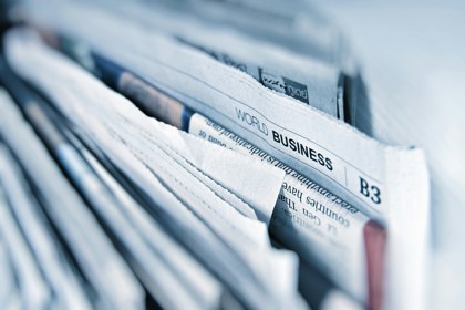 Close up of a stack of newspapers 