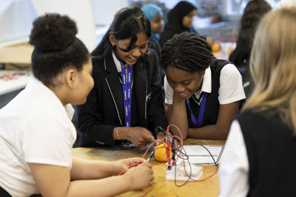 A group of girls doing an energy quest session